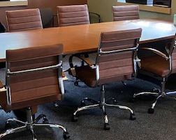 wood conference table with chairs