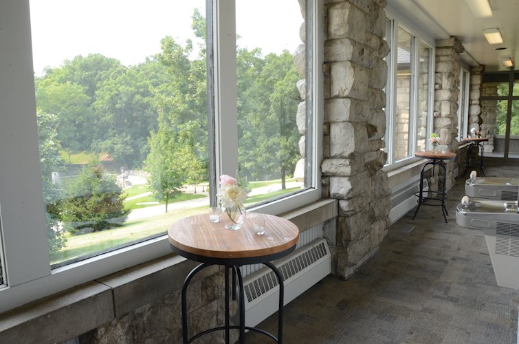 lincoln park pavilion side room with pub tables